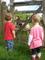 Our grandson Sam shows his friend the sheep